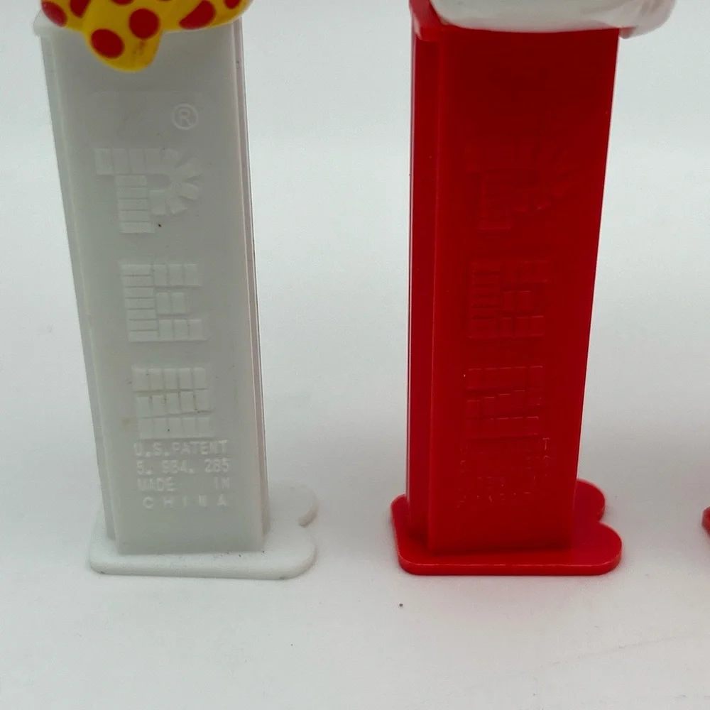 Lot Of 4 Vintage PEZ  Candy Dispensers Santa Clause And Snowman